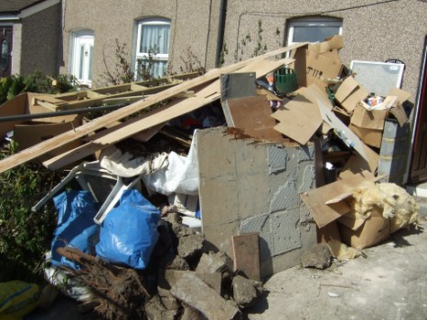 Professional waste clearance team at a construction site